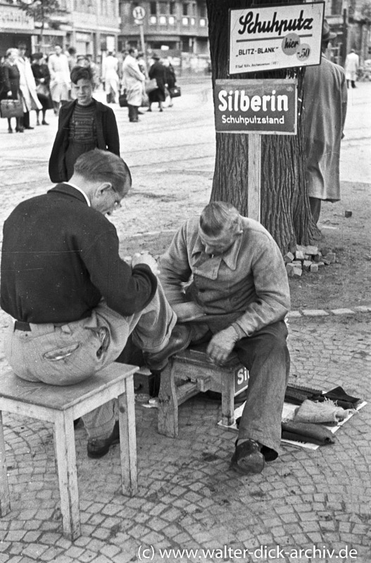 Schuhputzer auf dem Kölner Neumarkt